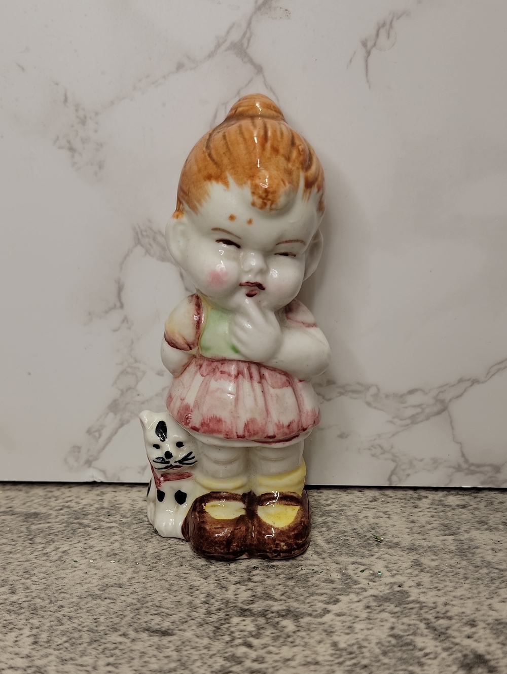 Vintage Japan Ceramic Girl Figurine with Cat – Closed‑Eye Mid Century Kitsch